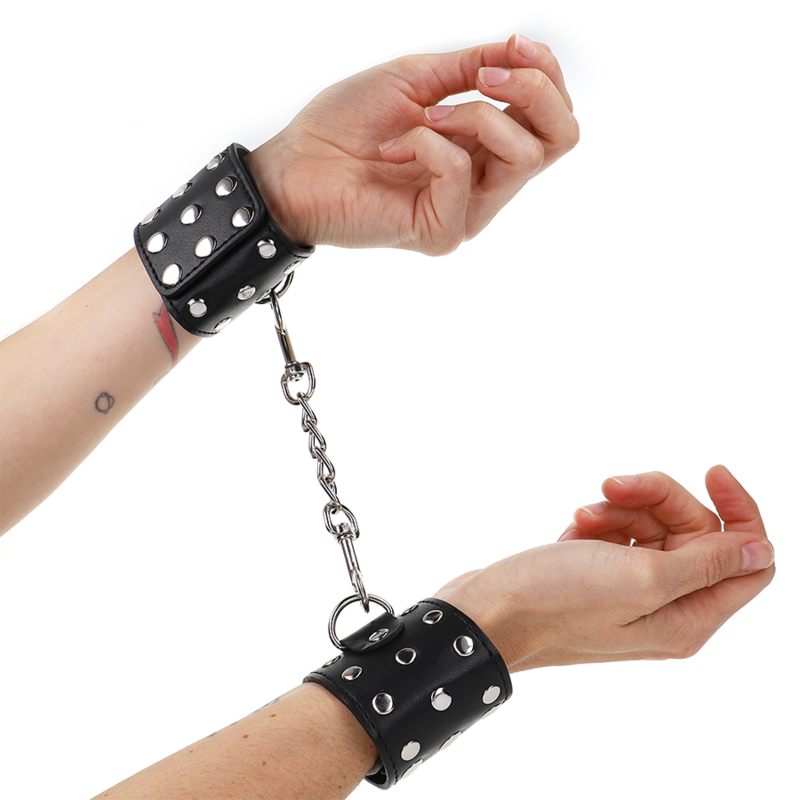 KINK - MUÑEQUERAS CON CIERRE A PRESIÓN LLENO DE TACHUELAS AJUSTABLE NEGRO 19-24 CM X 5.5 CM KINK WRIST RESTRAINT